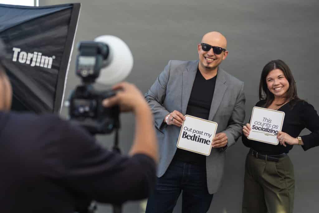Luxury photo booth setup with professional lighting and custom signage for event branding.