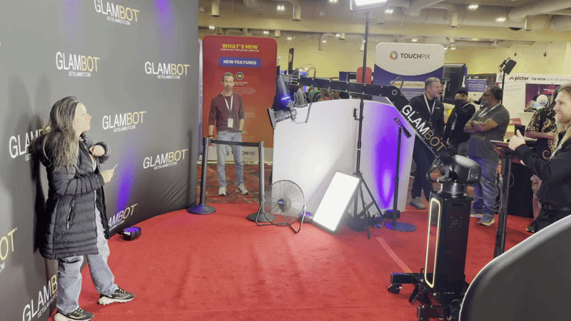 video gif of a person posing in front of a glam bot